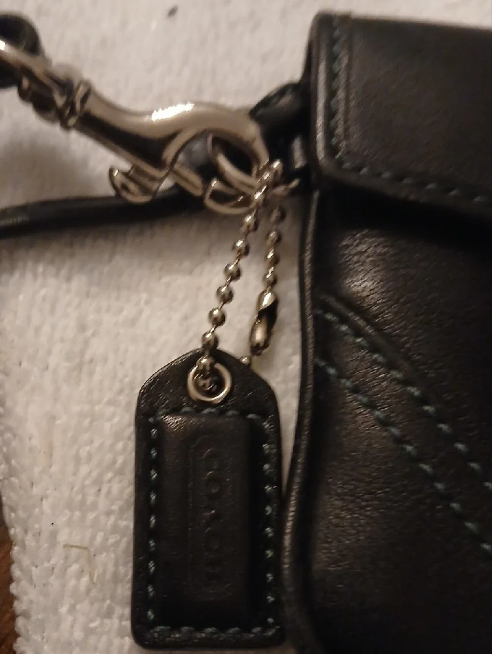 Coach sleek black
